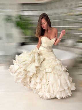 Maggie Sottero Ivory Strapless Sweetheart Ruffled Ballgown with Beaded Waist